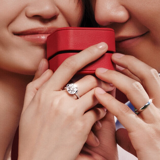 Chow Tai Fook wedding campaign with a couple and red jewellery box