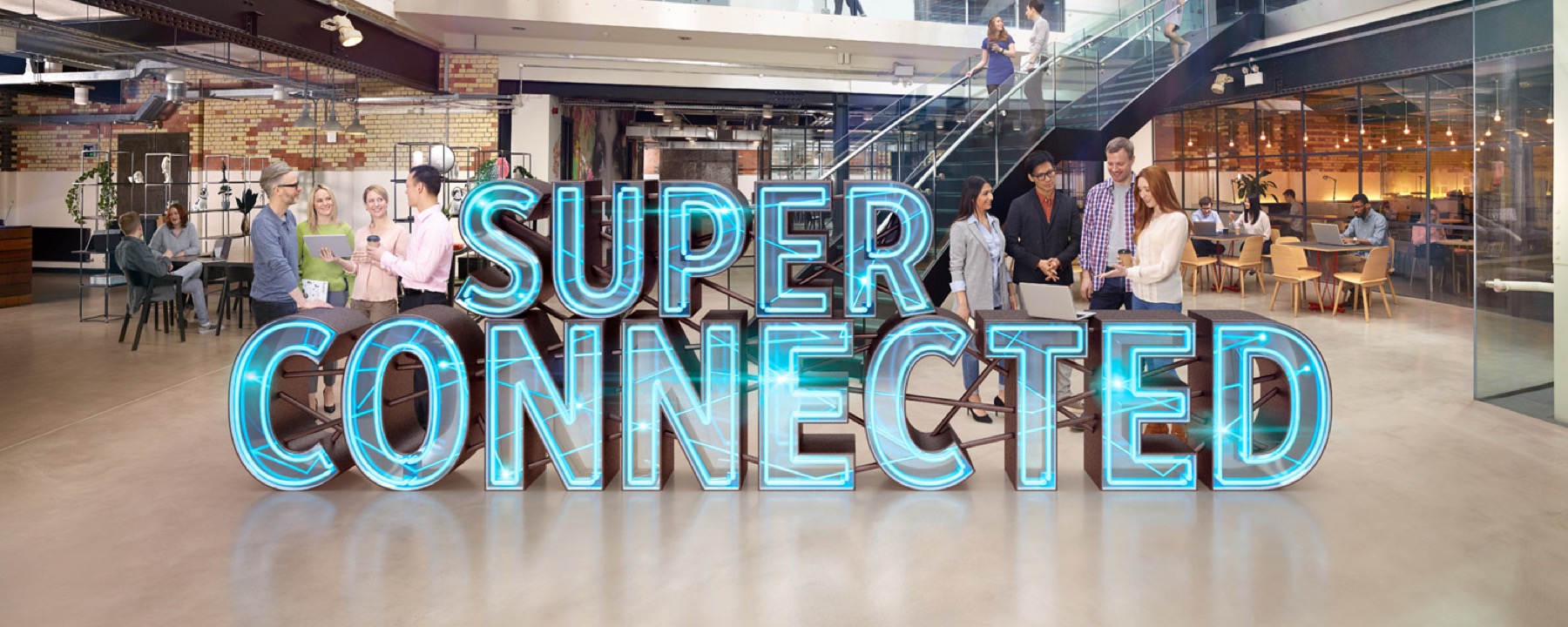 Superconnected workplace campaign showing teams in a contemporary office