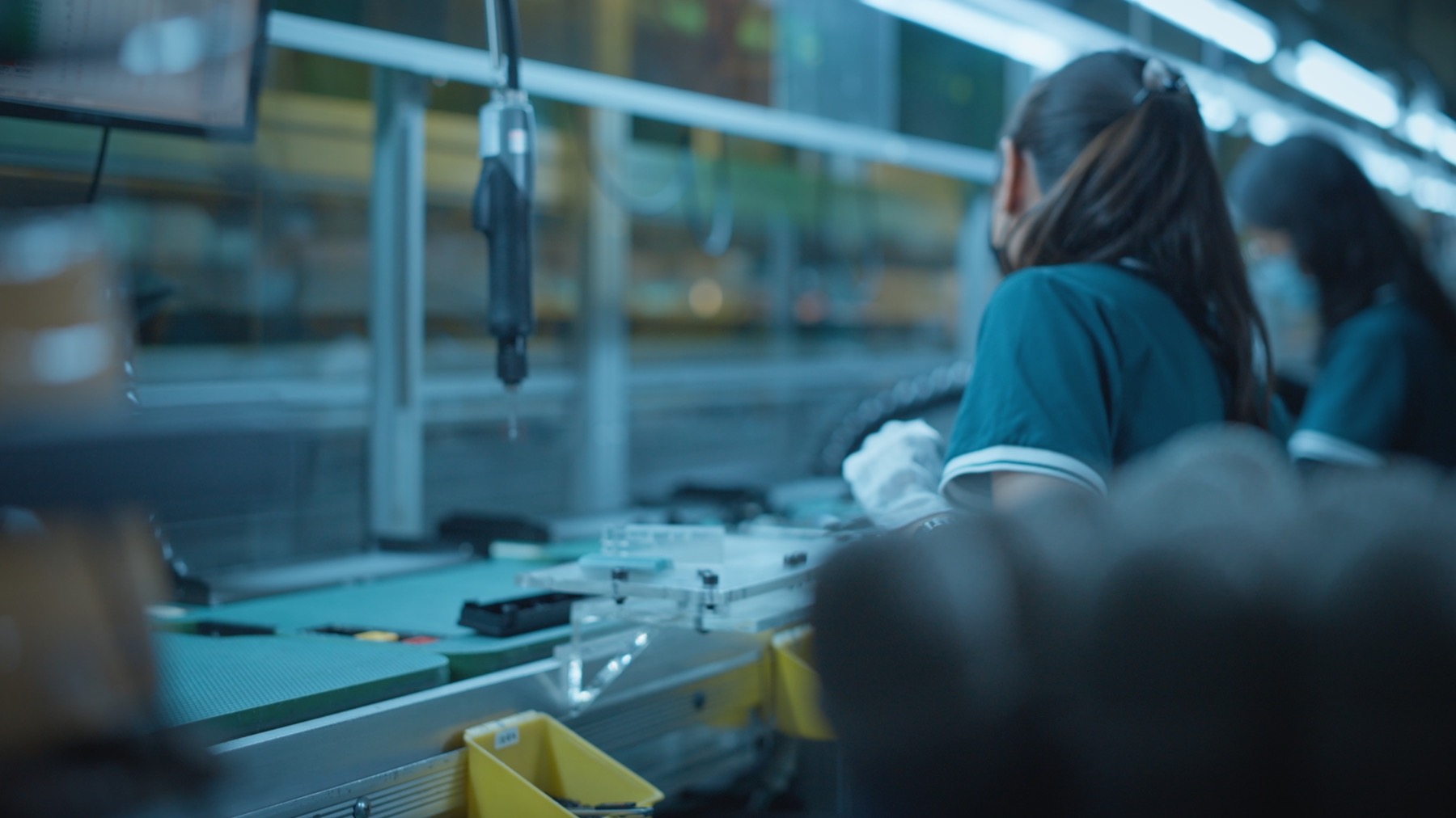 Worker on the MIPRO assembly line