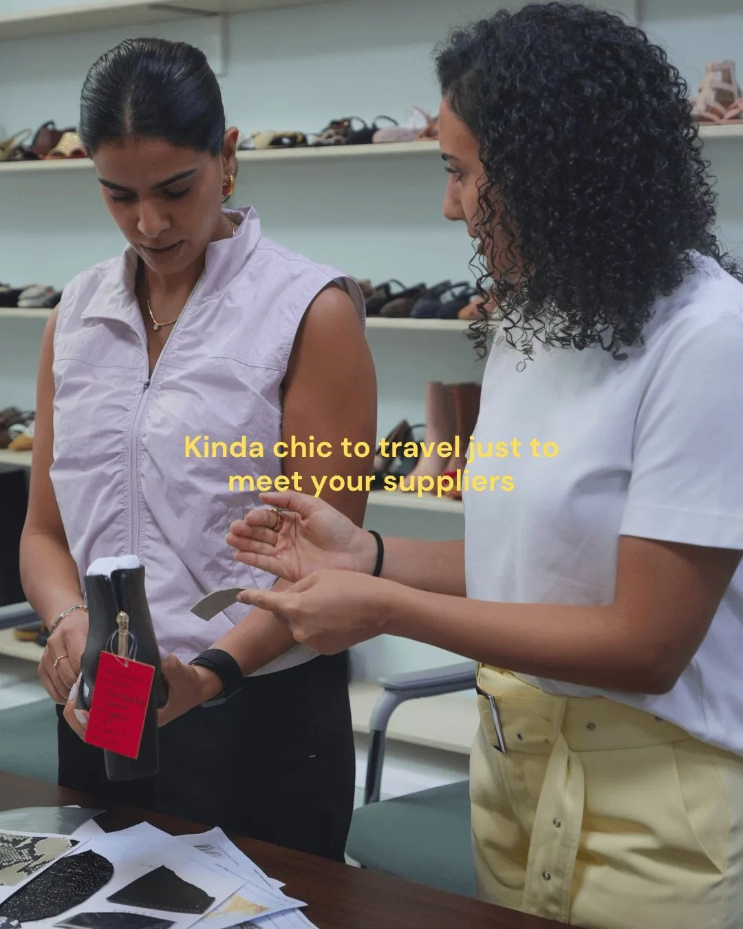 THUNA founders reviewing footwear materials during a supplier visit in Dongguan